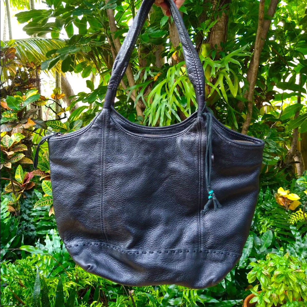 Minimalist sustainable Sak purse with turquoise